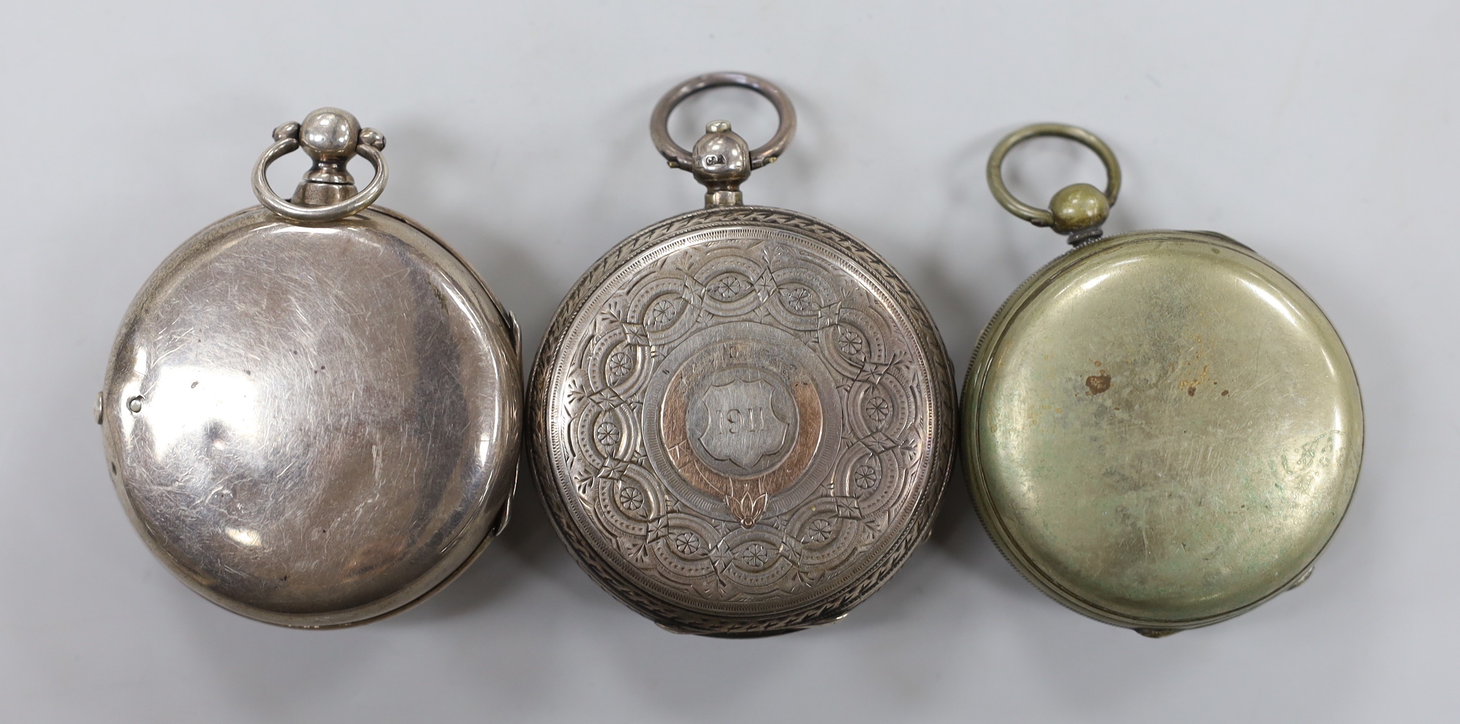 A late Victorian silver pair cased keywind verge pocket watch, indistinct maker, London, one other similar open faced pocket watch with silvered dial, by E.C, London, Maker to the Admiralty and an earlier base metal keyw